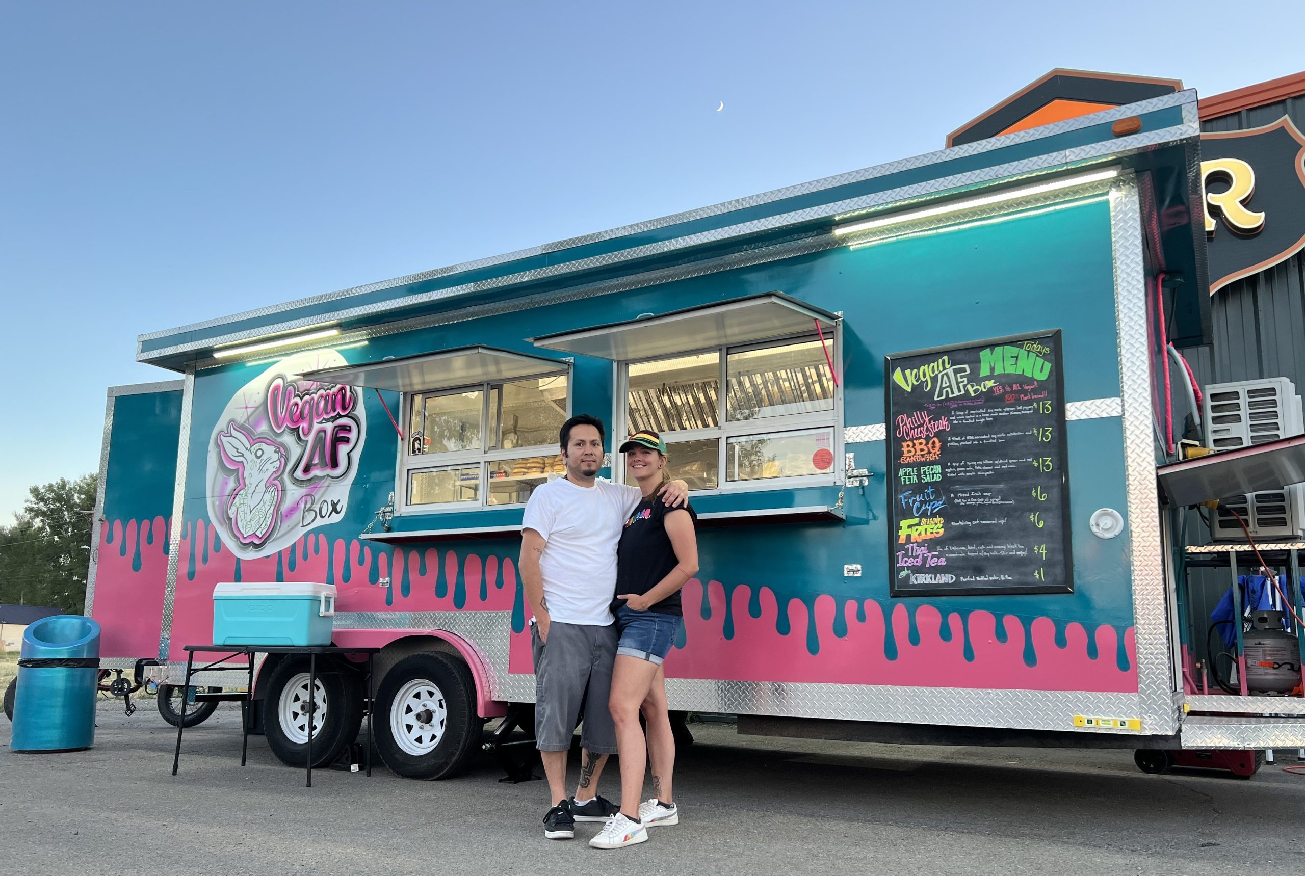 Vegan AF food truck Local couple in front of food truck